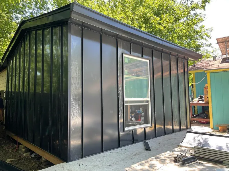 Black standing seam metal wall panels for Roof Inspection in Kenmore