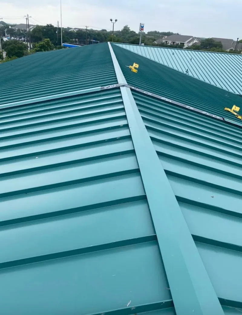 Green commercial metal roof ridge and valley for Metal Roof Repair in Kenmore